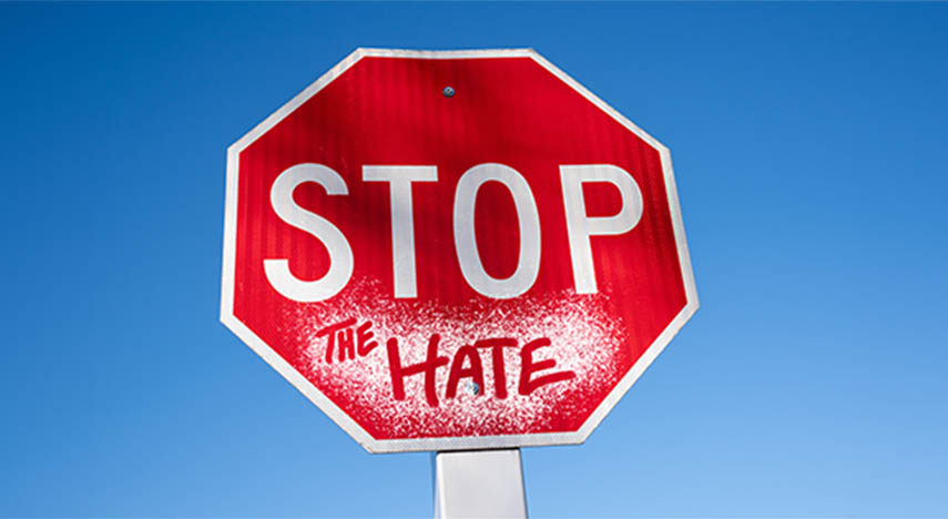 A stop sign that says "Stop the Hate"