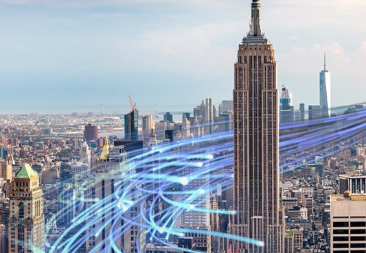 imaginary wavy lines representing broadband internet connections running through new york city skyline