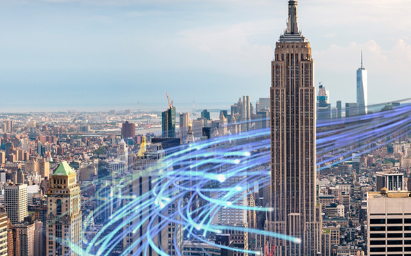 Simulated broadband wires swirl around the Empire State Building in New York City. 