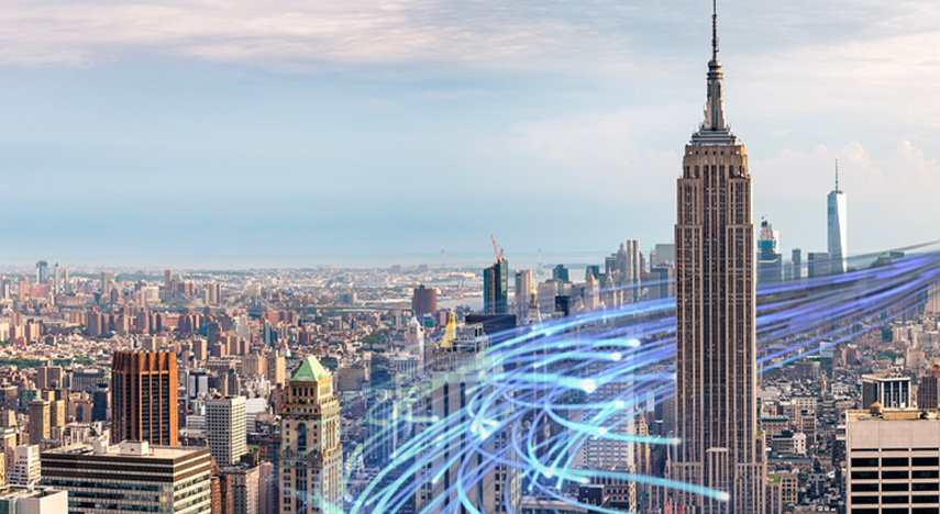 imaginary wavy lines representing broadband internet connections running through new york city skyline