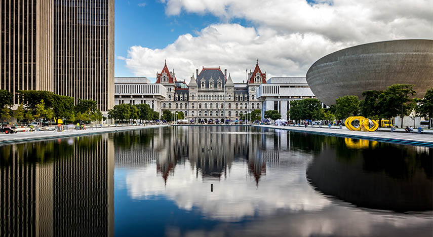 Albany, New York State Capitol building with water in foreground